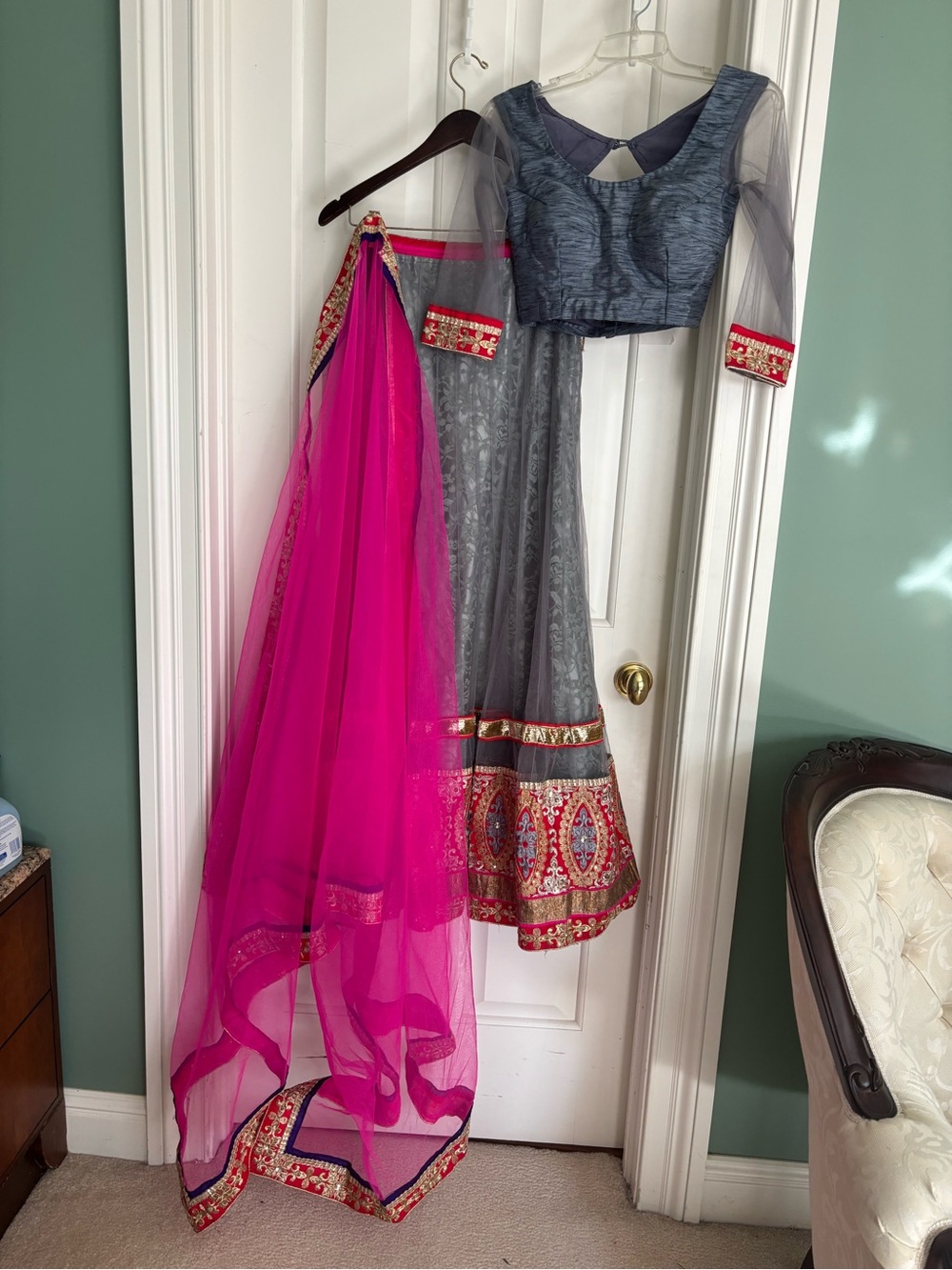 Grey color three piece small size Lehenga blouse with long sleeves beautiful